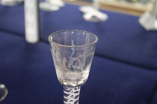 A wine glass, c.1770, with bucket bowl etched with floral sprigs, multi series opaque twist stem, 5.5in.